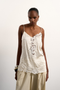 Front image of the Hallie sleeveless crinkle satin top in white, by brand Top shop