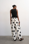 Back image of the Yara highrise dot barrel trousers in white, by brand Top shop