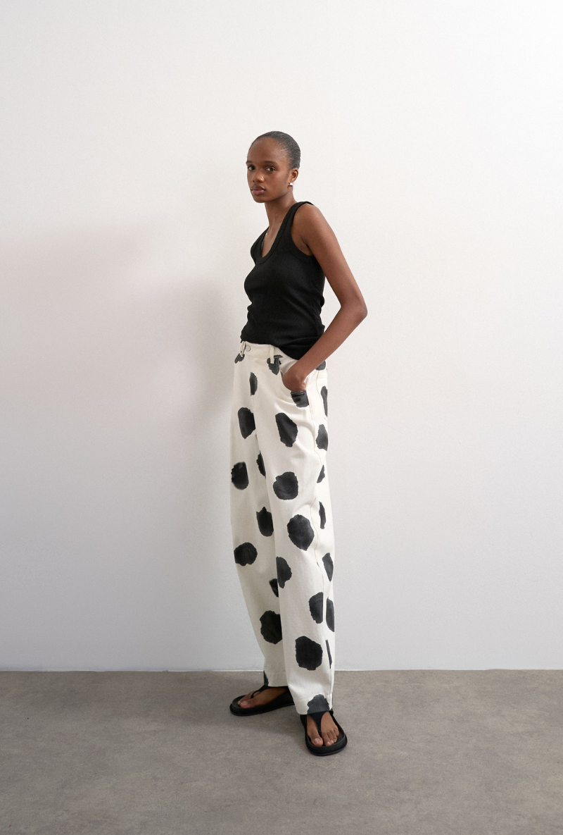 Front image of Yara highrise dot barrel trousers in white, by brand Top shop