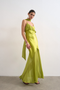 Front image of a model wearing Annika ruffle maxi dress in green, by brand Top shop