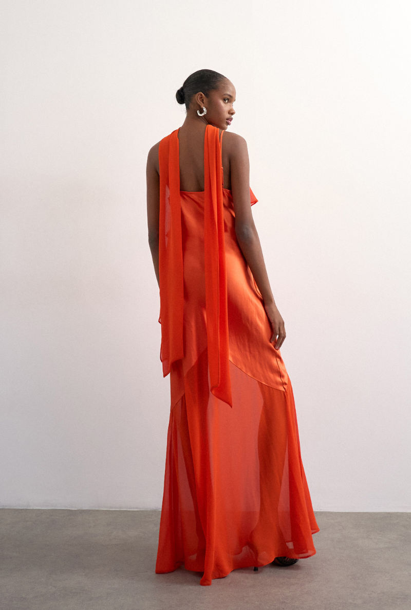 Back image of a model wearing Annika ruffle maxi dress in rust, by brand Top shop