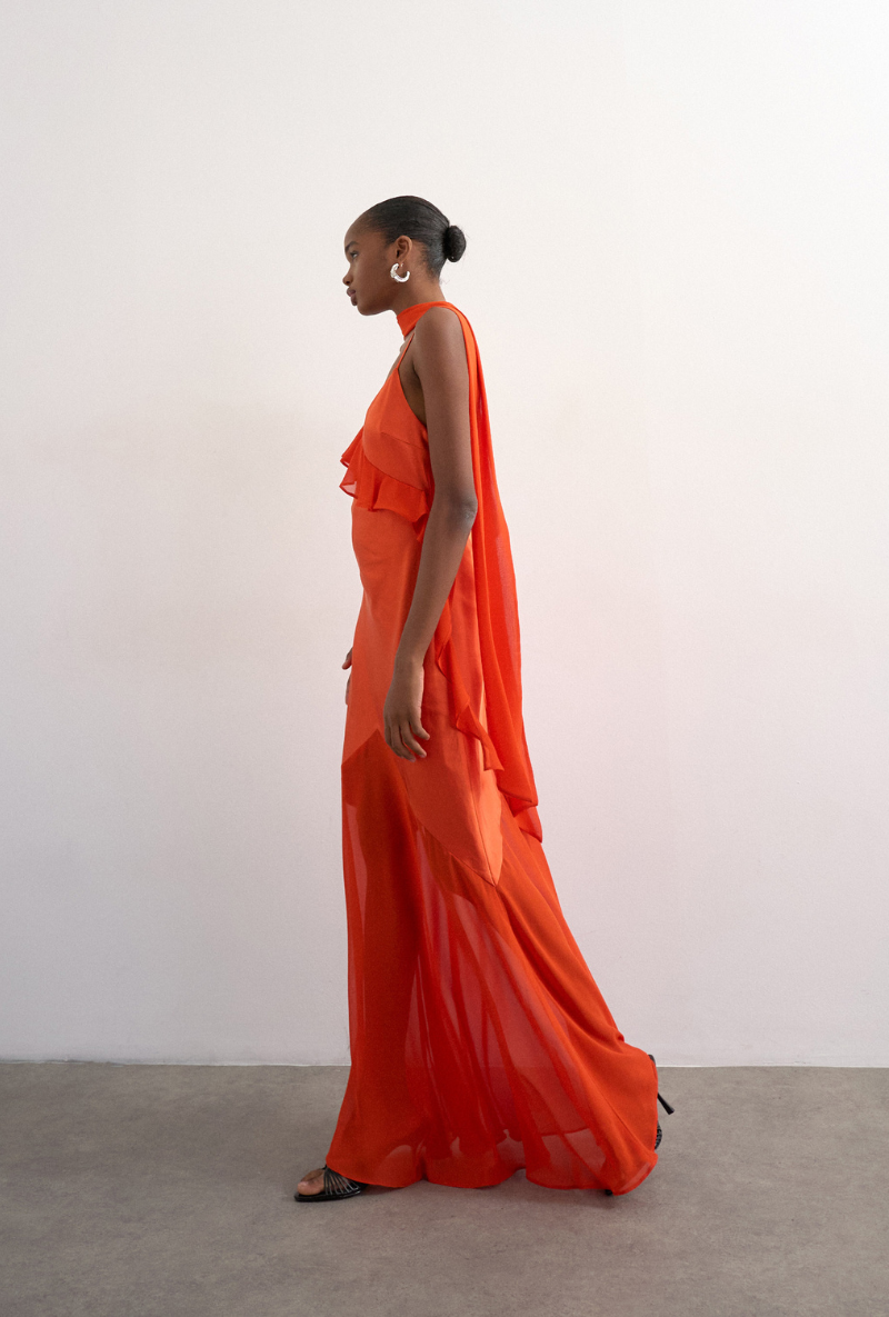 Front image of a model wearing Annika ruffle maxi dress in rust, by brand Top shop