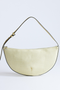 Front image  of Curly canvas scoop shoulder bag in lemon, by brand Top shop