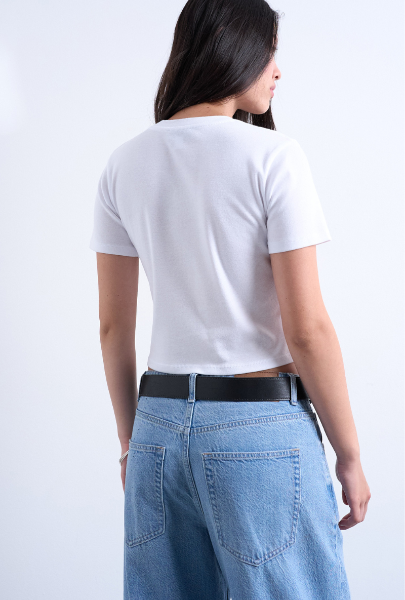 Back image of a model wearing Everyday crop top in white, by brand Top shop