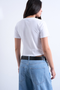 Back image of a model wearing the Everyday crop top in white, by brand Top shop