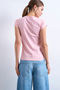 Back image of a model wearing the Everyday top in pink, by brand Top shop