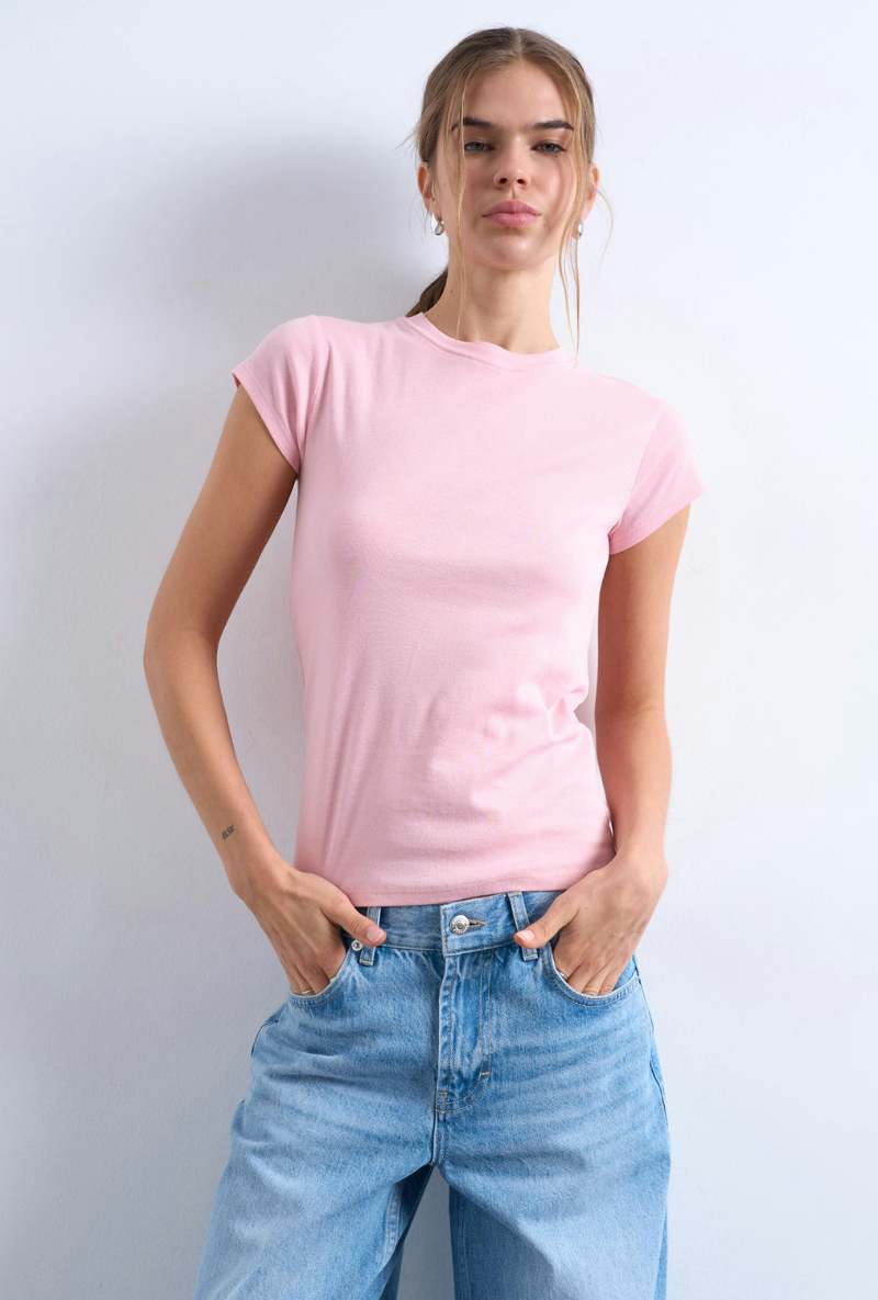 Front image of a model wearing Everyday top in pink, by brand Top shop