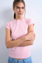 Front image of a model wearing the Everyday top in pink, by brand Top shop
