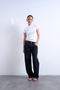 Front image of a model wearing Everyday top in white, by brand Top shop
