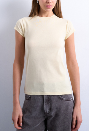 Front image of a model wearing the Everyday top in yellow, by brand Top shop
