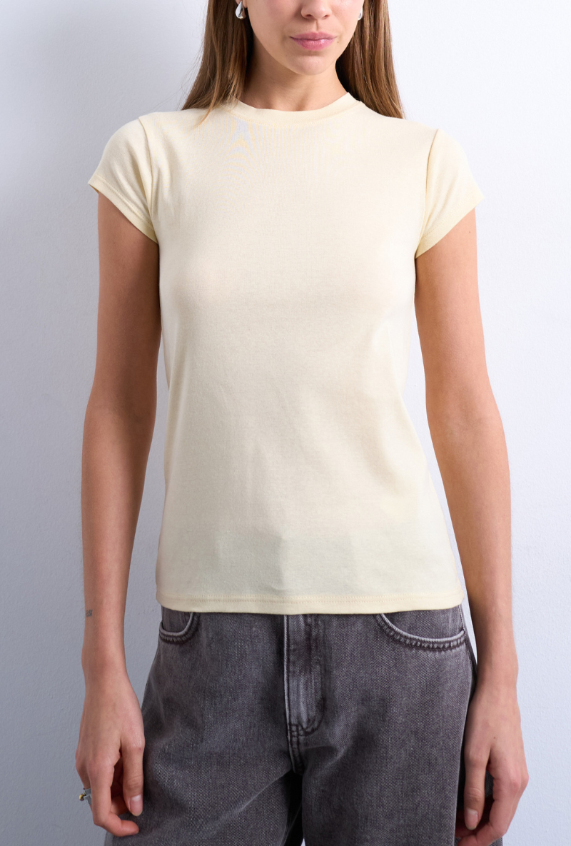 Front image of a model wearing Everyday top in yellow, by brand Top shop