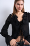 Front image of a model wearing the Fiona ruffle top in black, by brand Top shop