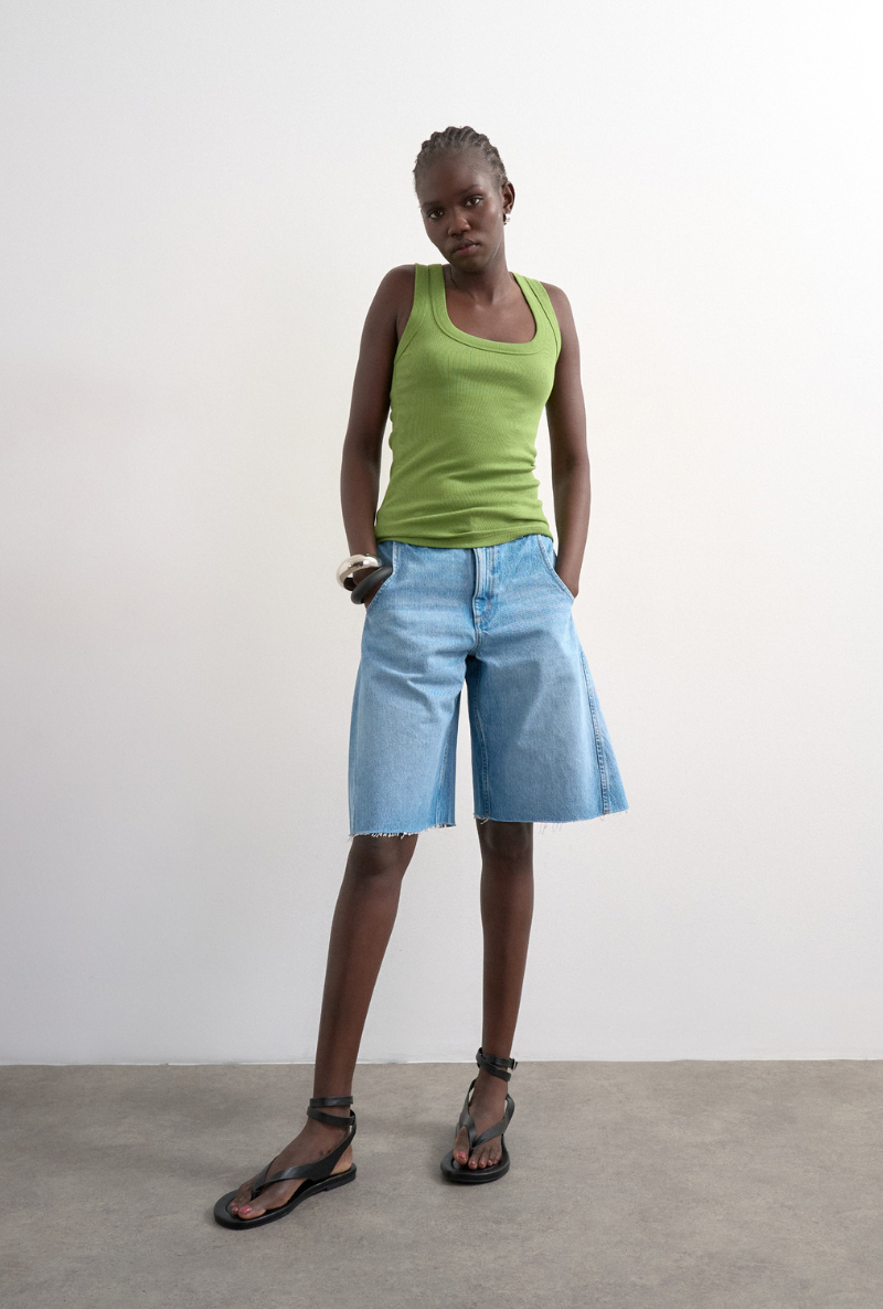 Front image of a model wearing Honey vest in green, by brand Top shop