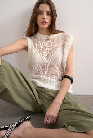 Front image of a model wearing the Josephine emb o in off white, by brand Top shop