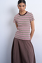 Front image of a model wearing the Sally stripe rib tee in pink, by brand Top shop