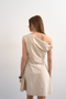 Back image of a model wearing the Zenia mini dress in ecru, by brand Top shop