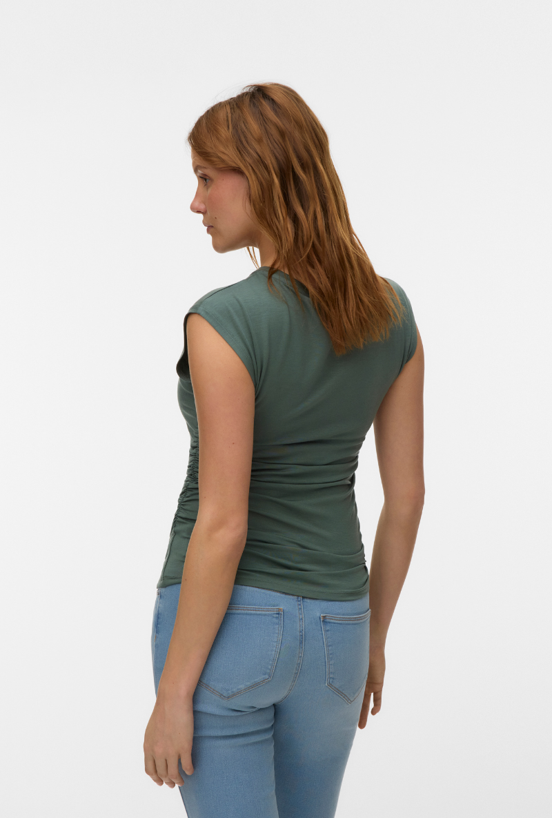 Back image of a model wearing Ava sarah top in khaki, by brand Vero moda
