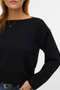 Detail image of a model wearing the Vero moda hali l/s boat neck top in black, by brand Vero moda