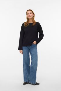 Front image of a model wearing the Vero moda hali l/s boat neck top in black, by brand Vero moda