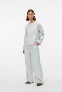 Front image of a model wearing the Vero moda hali l/s boat neck top in light grey, by brand Vero moda