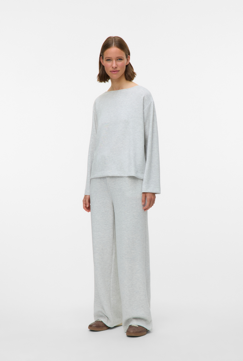 Front image of a model wearing Vero moda hali hw wide pants in light grey, by brand Vero moda