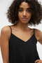 Front detail image of a model wearing the Josie calf singlet dress in black, by brand Vero moda