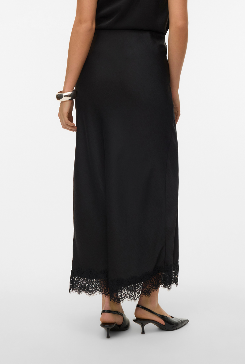 Back image of a model wearing Vero moda julia hw lace maxi skirt in black, by brand Vero moda