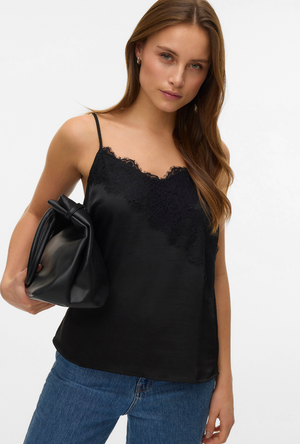 Front image of a model wearing the Vero moda julie singlet lace top in black, by brand Vero moda