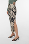 Front image of a model wearing the Malene ankle skirt in black/white, by brand Vero moda