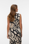 Back image of a model wearing the Malene sl oneck top in black/white, by brand Vero moda