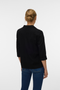 Back image of a model wearing the Milo loose blazer in black, by brand Vero moda