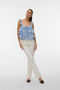 Front image of a model wearing Sandy layered top in blue, by brand Vero moda