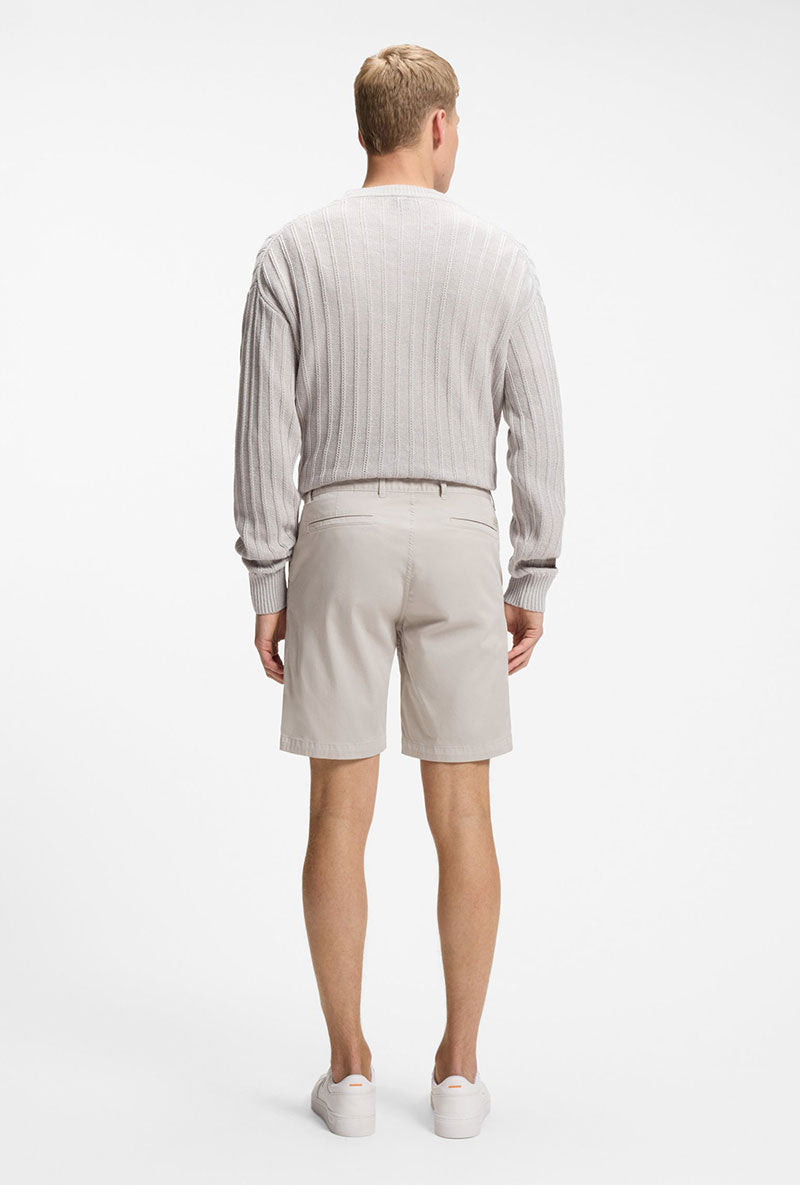 Back image of a model wearing Chino slim shorts in light grey, by brand Boss