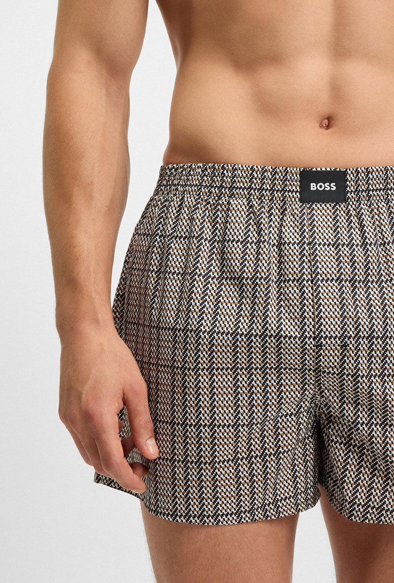 Front image of a model wearing Cw peach 2 pk boxer shorts in black, by brand Boss