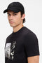 Front image of a model wearing the Derrel cap in black, by brand Boss