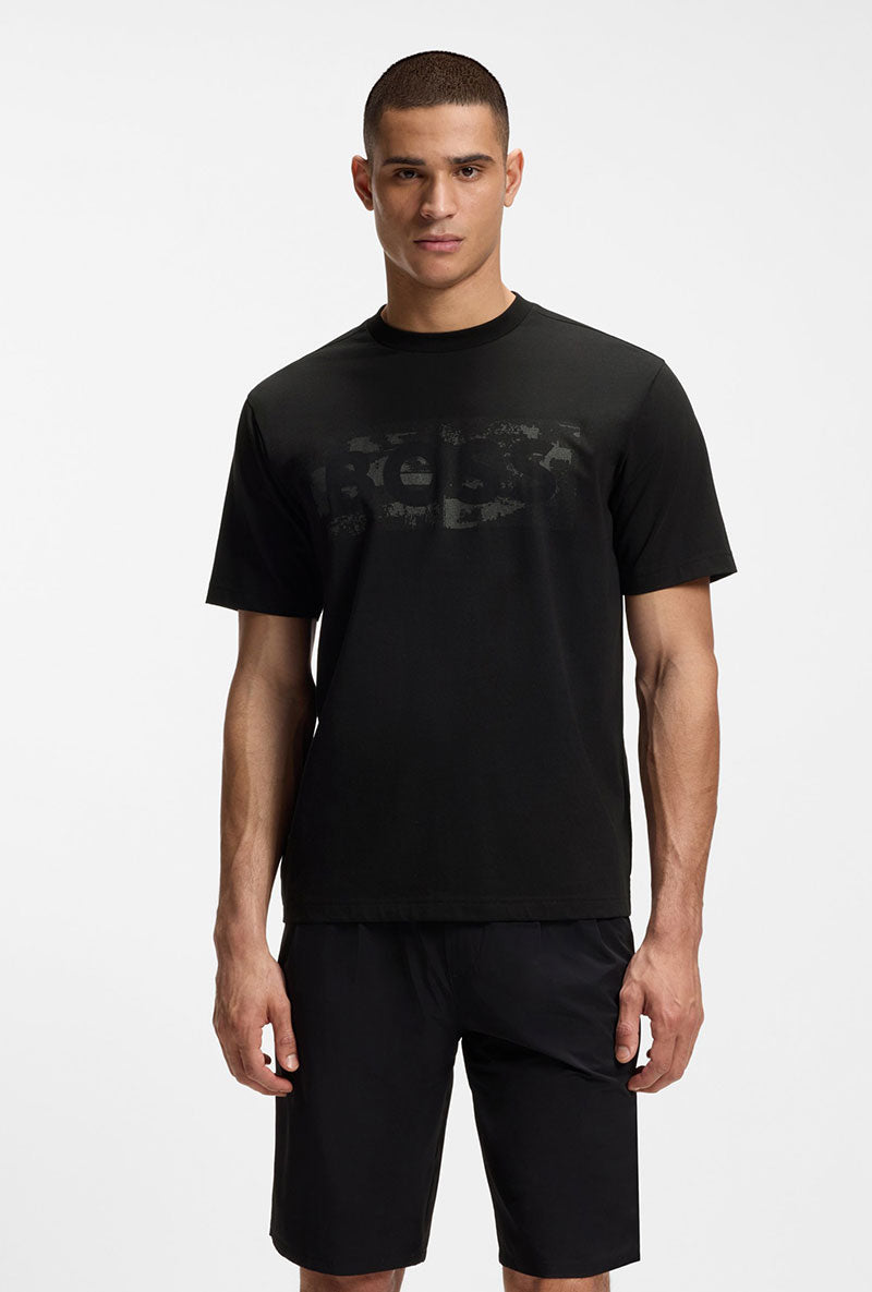 Front image of a model wearing Globe logo tshirt in black, by brand Boss