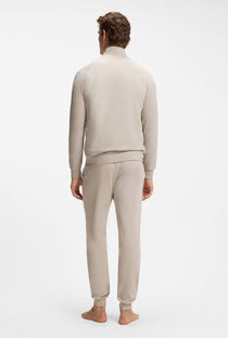 Back image of a model wearing the Mix and match jacket in beige, by brand Boss