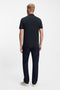 Back image of a model wearing the Passenger polo in navy, by brand Boss