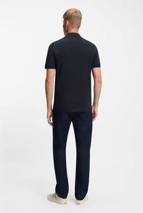 Back image of a model wearing the Passenger polo in navy, by brand Boss