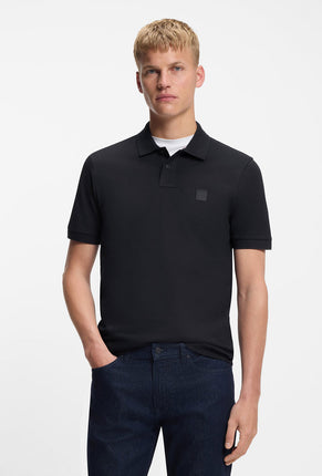 Front image of a model wearing Passenger polo in navy, by brand Boss