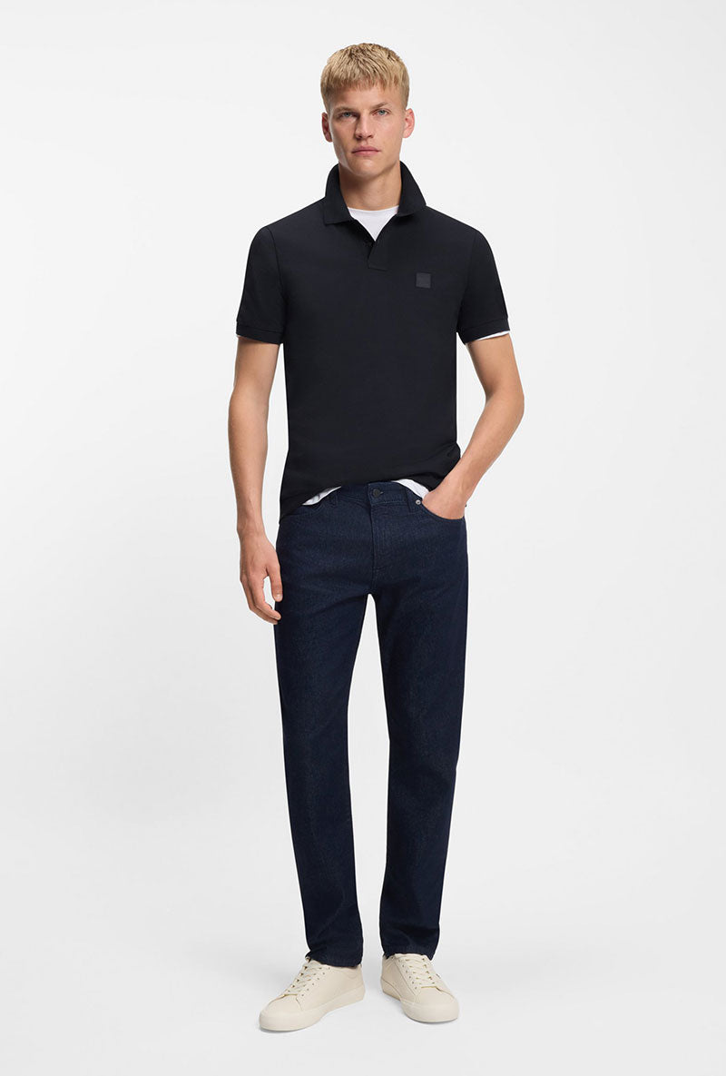 Front image of a model wearing Passenger polo in navy, by brand Boss