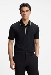 Front image of a model wearing the Philix zip polo in black, by brand Boss