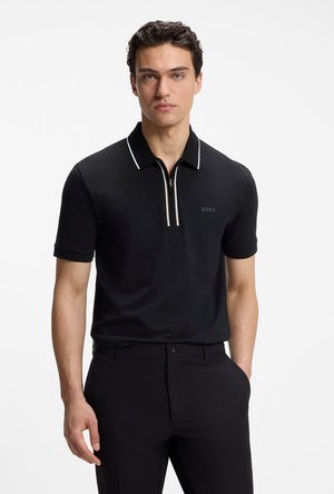 Front image of a model wearing the Philix zip polo in black, by brand Boss