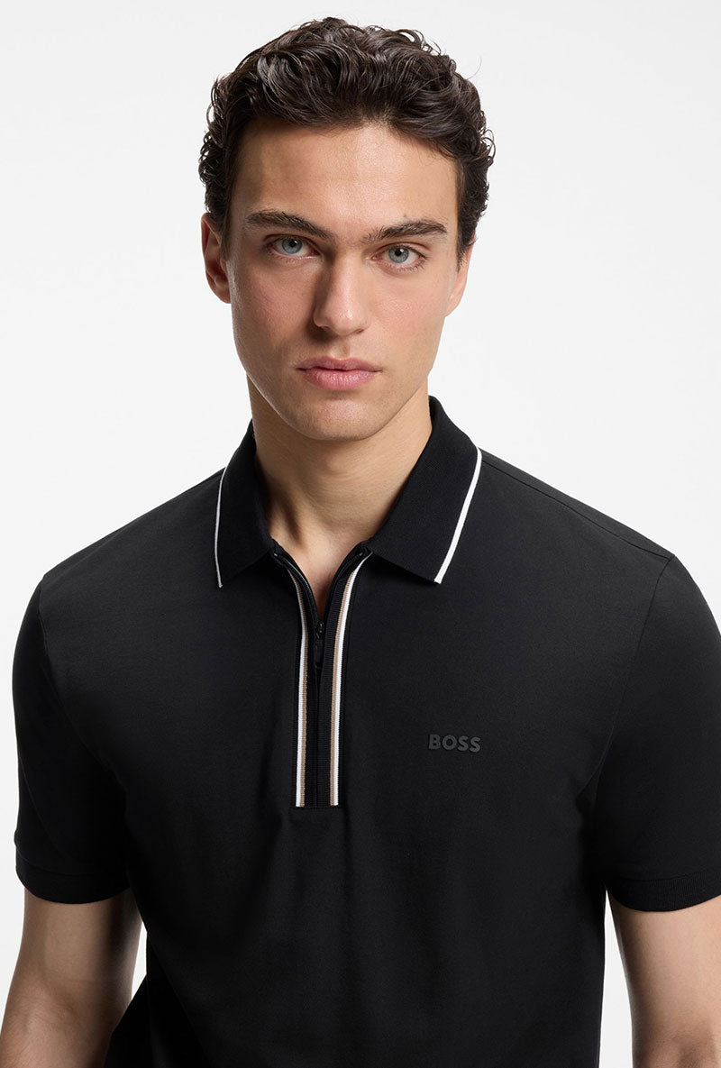 Front image of a model wearing Philix zip polo in black, by brand Boss