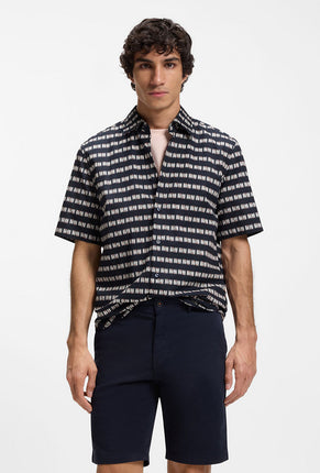 Front image of a model wearing Rash 2 aop ss shirt in navy, by brand Boss