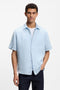 Front image of a model wearing Rash 2 ss shirt in light blue, by brand Boss