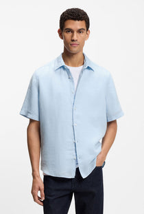 Front image of a model wearing the Rash 2 ss shirt in light blue, by brand Boss