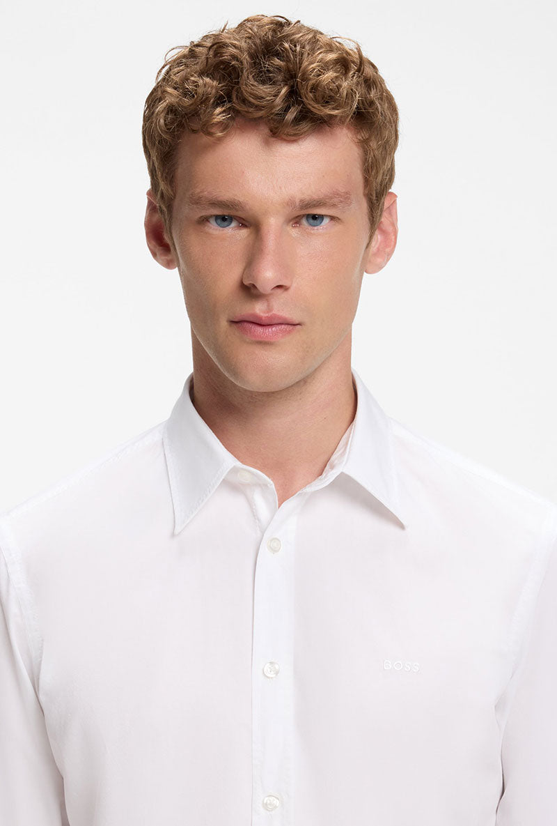 Front image of a model wearing Relegant ls shirt in white, by brand Boss
