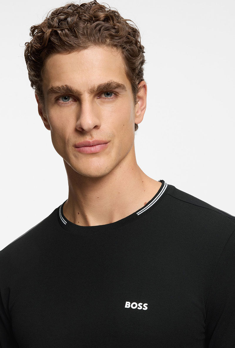 Front image of a model wearing Taul t-shirt in black, by brand Boss