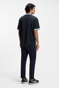 Back image of a model wearing the Te blocks tshirt in navy, by brand Boss